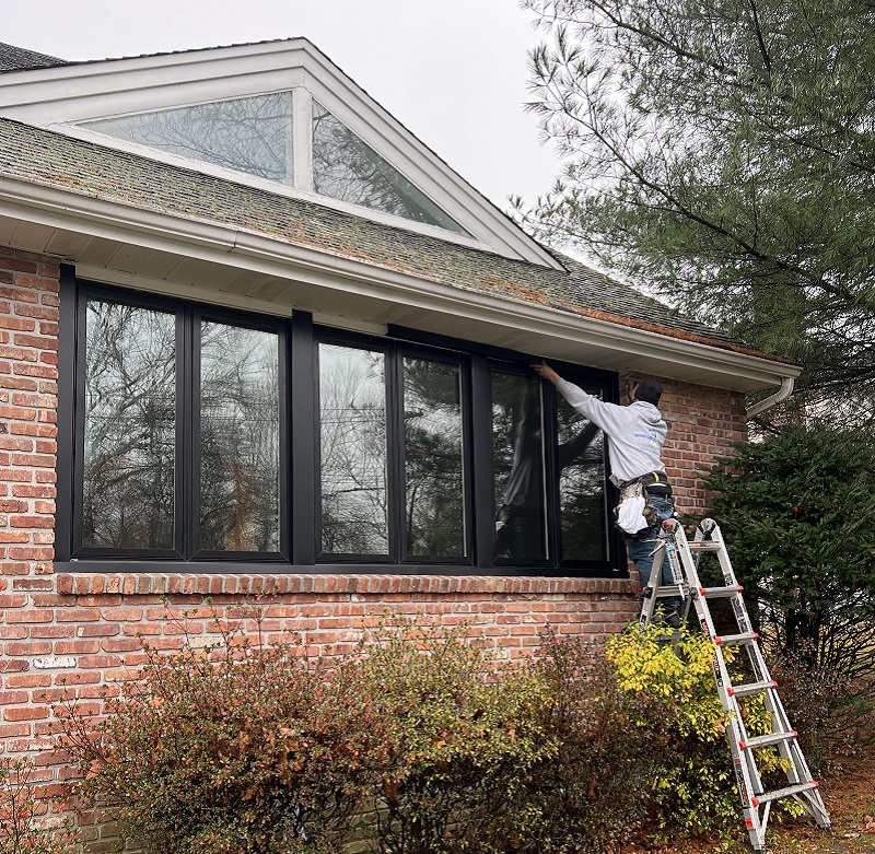 Pella Impervia Black Sliding Window Replacement In White Plains, NY